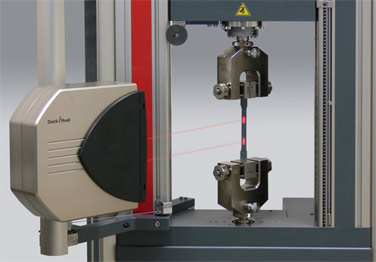 Zwick's latest laserXtens® non-contact extensometer operating without specimen marks.
