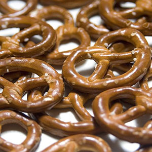 Maltodextrin is used in coatings for foods like pretzels to create a glossy surface.