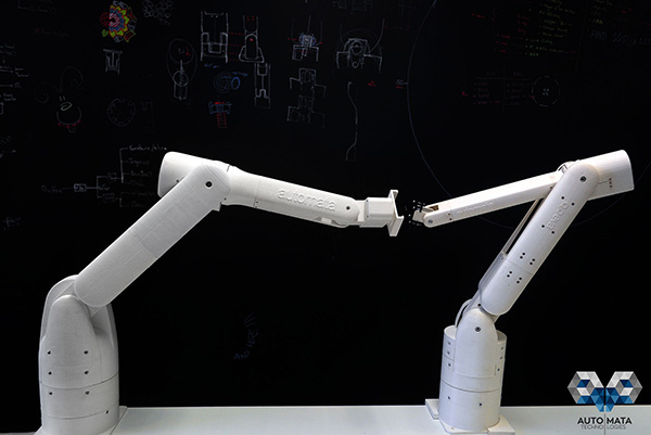 London-based Automata has produced two prototypes of their lightweight robotic arm, Eva. Here, Eva 9 (left) meets Eva 8 (right).