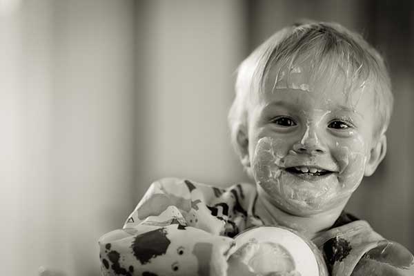 Child enjoying yogurt - learn about probiotic market trends in the Prospector Knowledge Center.