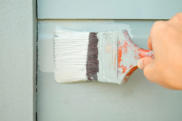 photo of a person painting - learn more about polyurethane coatings