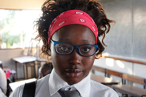 Mozambique girl wearing glasses - Learn about USee’s back story