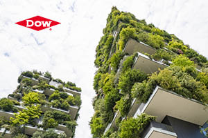 Buildings covered in foliage with Dow logo