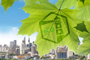 Leaf in front of a city with the eCO logo