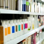 shampoo products on a shelf - learn about structured surfactant technology