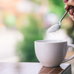 Sugar being added to coffee - Learn about anti-caking agents